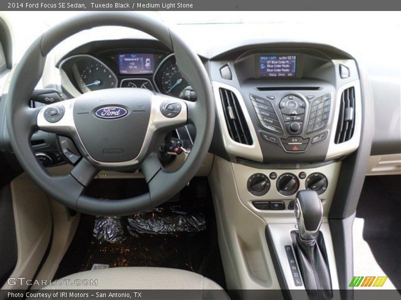 Tuxedo Black / Medium Light Stone 2014 Ford Focus SE Sedan