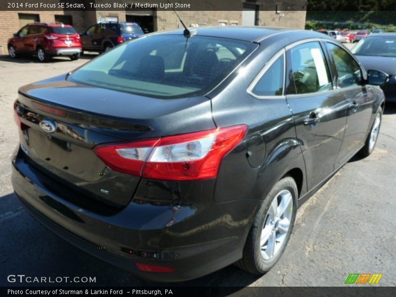Tuxedo Black / Medium Light Stone 2014 Ford Focus SE Sedan