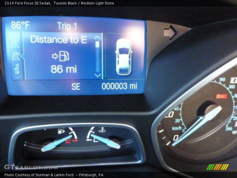 Tuxedo Black / Medium Light Stone 2014 Ford Focus SE Sedan