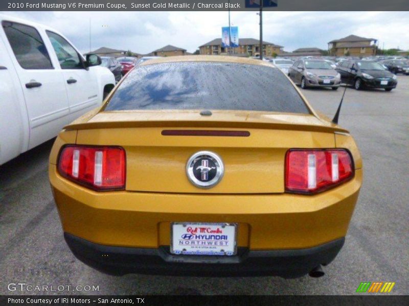 Sunset Gold Metallic / Charcoal Black 2010 Ford Mustang V6 Premium Coupe