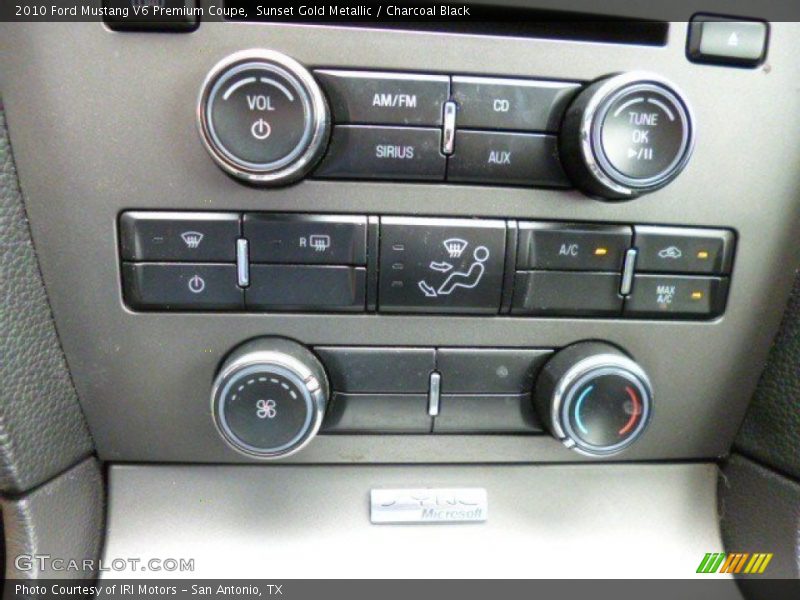 Sunset Gold Metallic / Charcoal Black 2010 Ford Mustang V6 Premium Coupe