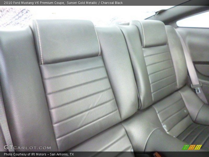 Sunset Gold Metallic / Charcoal Black 2010 Ford Mustang V6 Premium Coupe
