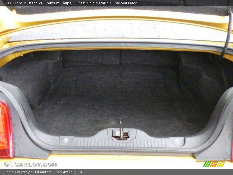 Sunset Gold Metallic / Charcoal Black 2010 Ford Mustang V6 Premium Coupe