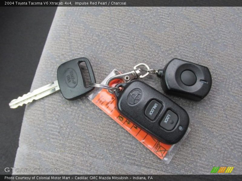 Impulse Red Pearl / Charcoal 2004 Toyota Tacoma V6 Xtracab 4x4
