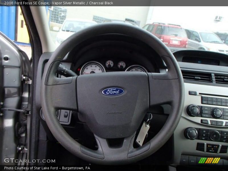 Vapor Silver Metallic / Charcoal Black 2008 Ford Focus SE Coupe
