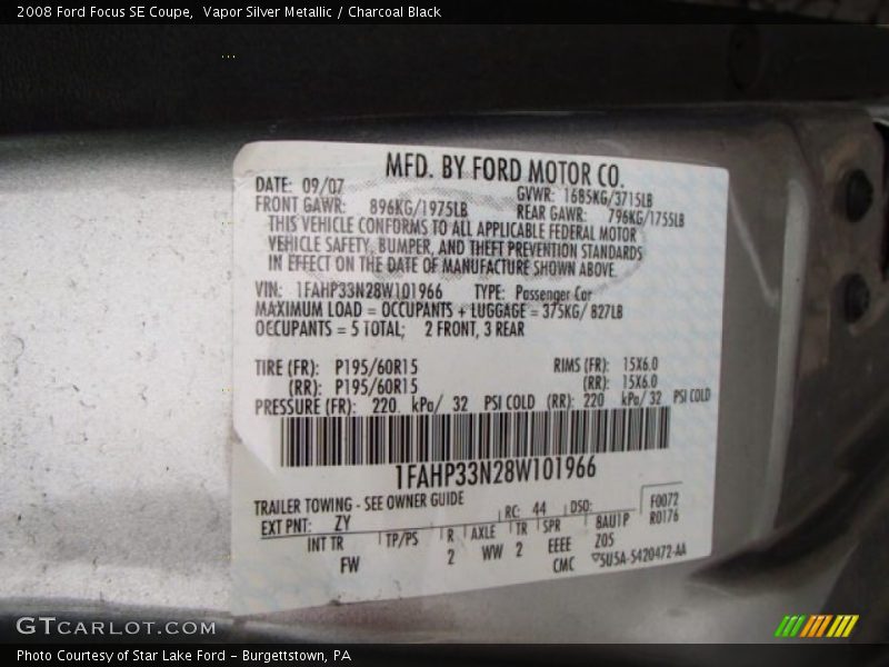 Vapor Silver Metallic / Charcoal Black 2008 Ford Focus SE Coupe