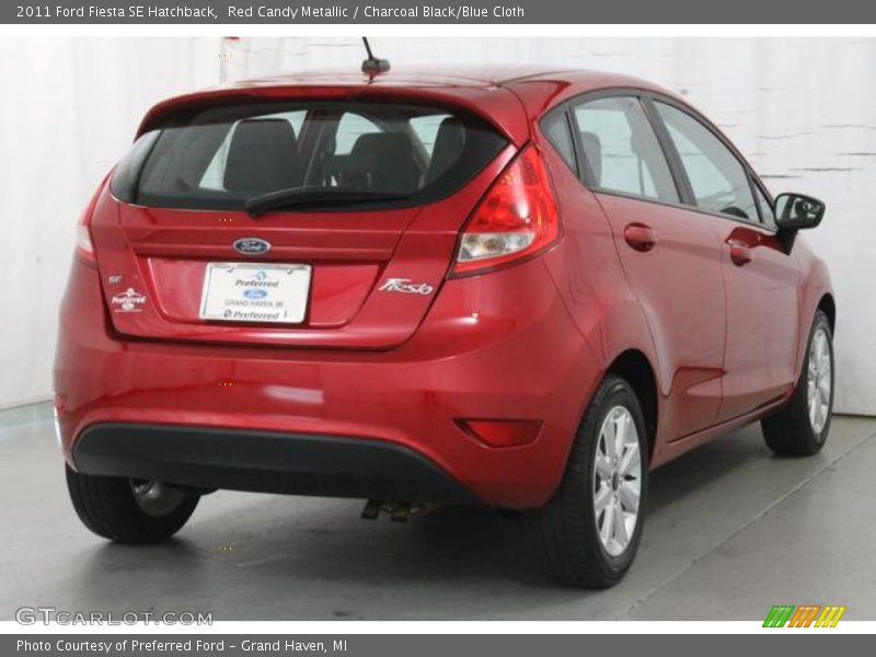 Red Candy Metallic / Charcoal Black/Blue Cloth 2011 Ford Fiesta SE Hatchback