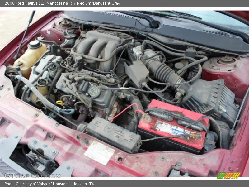Merlot Metallic / Medium/Dark Flint Grey 2006 Ford Taurus SE