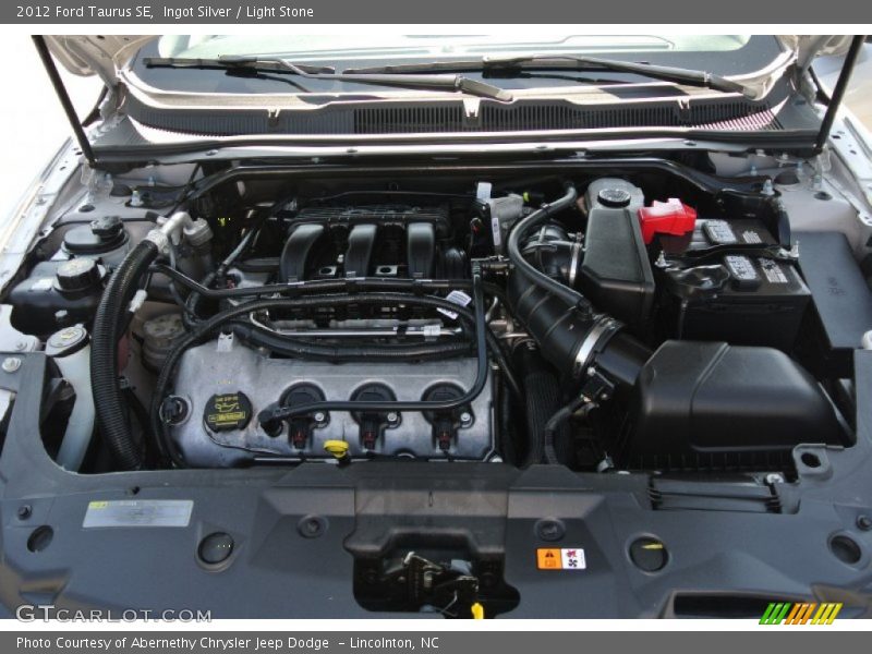 Ingot Silver / Light Stone 2012 Ford Taurus SE
