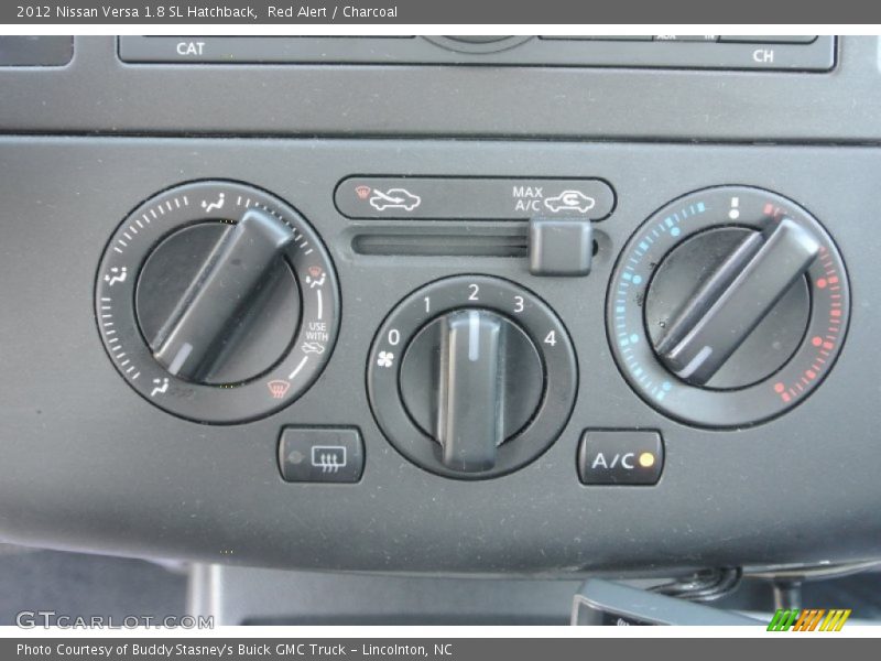 Red Alert / Charcoal 2012 Nissan Versa 1.8 SL Hatchback