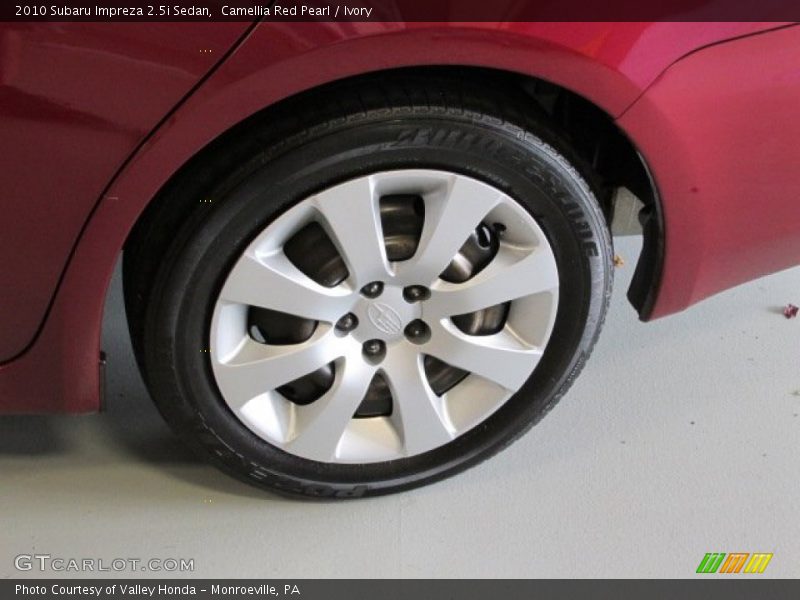 Camellia Red Pearl / Ivory 2010 Subaru Impreza 2.5i Sedan