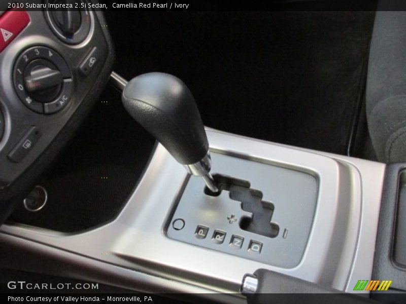 Camellia Red Pearl / Ivory 2010 Subaru Impreza 2.5i Sedan