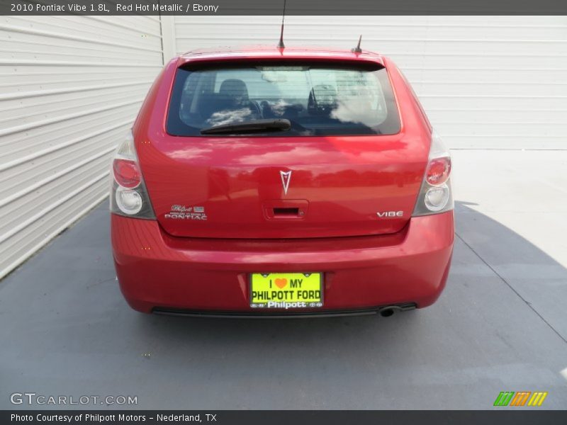 Red Hot Metallic / Ebony 2010 Pontiac Vibe 1.8L