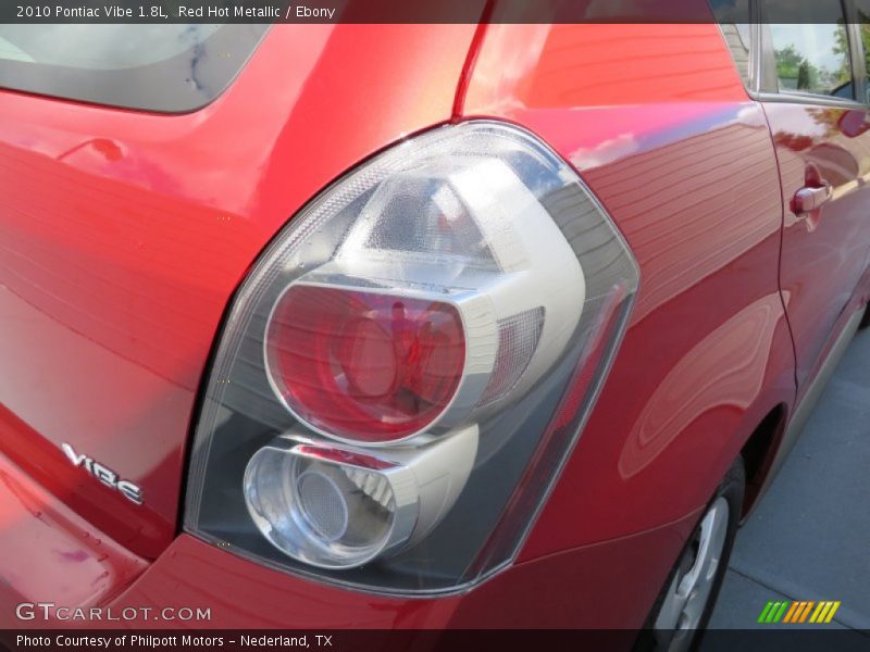 Red Hot Metallic / Ebony 2010 Pontiac Vibe 1.8L