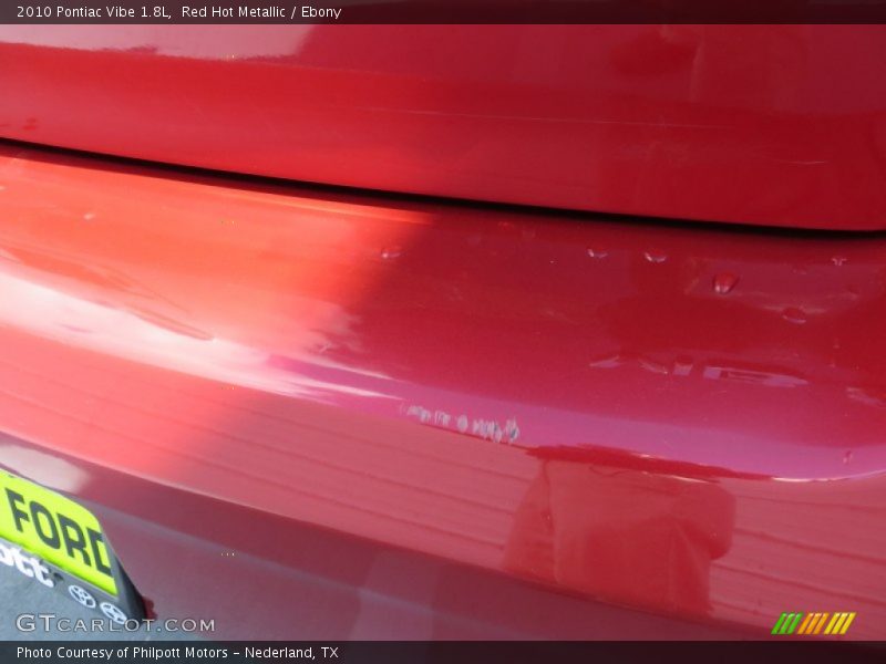 Red Hot Metallic / Ebony 2010 Pontiac Vibe 1.8L