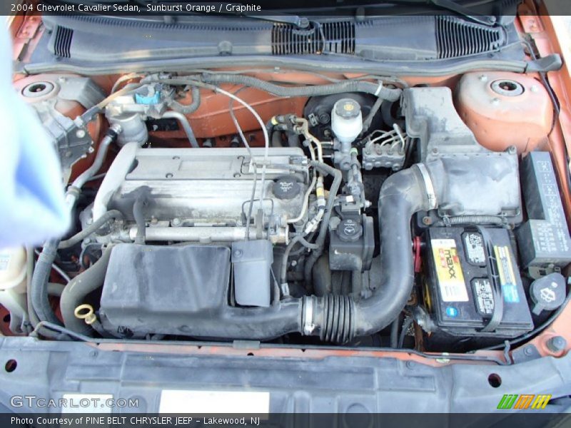 Sunburst Orange / Graphite 2004 Chevrolet Cavalier Sedan