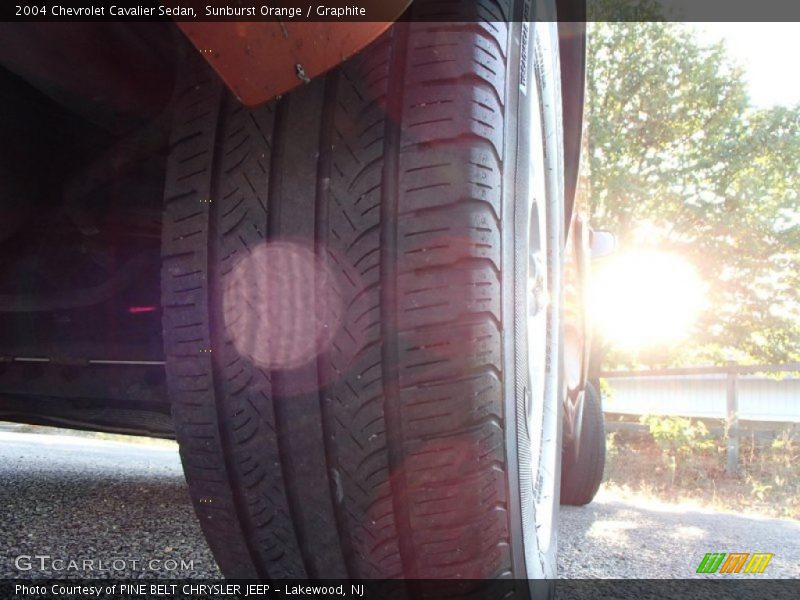 Sunburst Orange / Graphite 2004 Chevrolet Cavalier Sedan