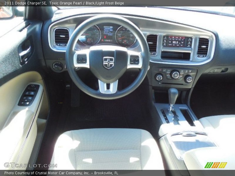 Toxic Orange Pearl / Black/Light Frost Beige 2011 Dodge Charger SE