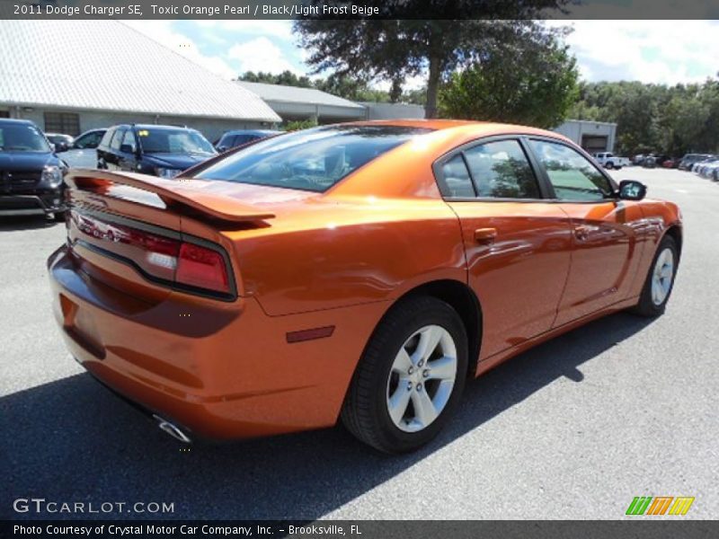 Toxic Orange Pearl / Black/Light Frost Beige 2011 Dodge Charger SE