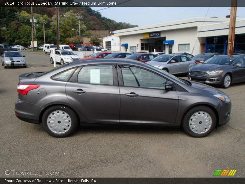 Sterling Gray / Medium Light Stone 2014 Ford Focus SE Sedan