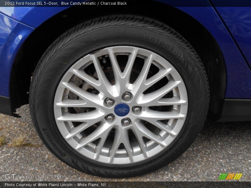 Blue Candy Metallic / Charcoal Black 2012 Ford Focus SEL 5-Door