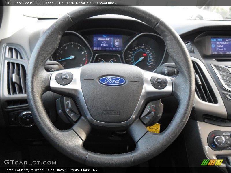 Blue Candy Metallic / Charcoal Black 2012 Ford Focus SEL 5-Door