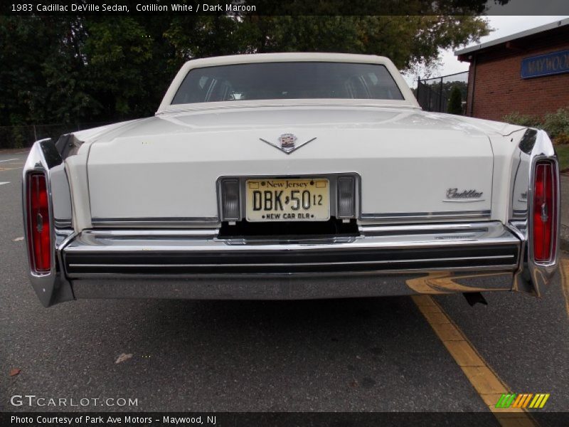 Cotillion White / Dark Maroon 1983 Cadillac DeVille Sedan