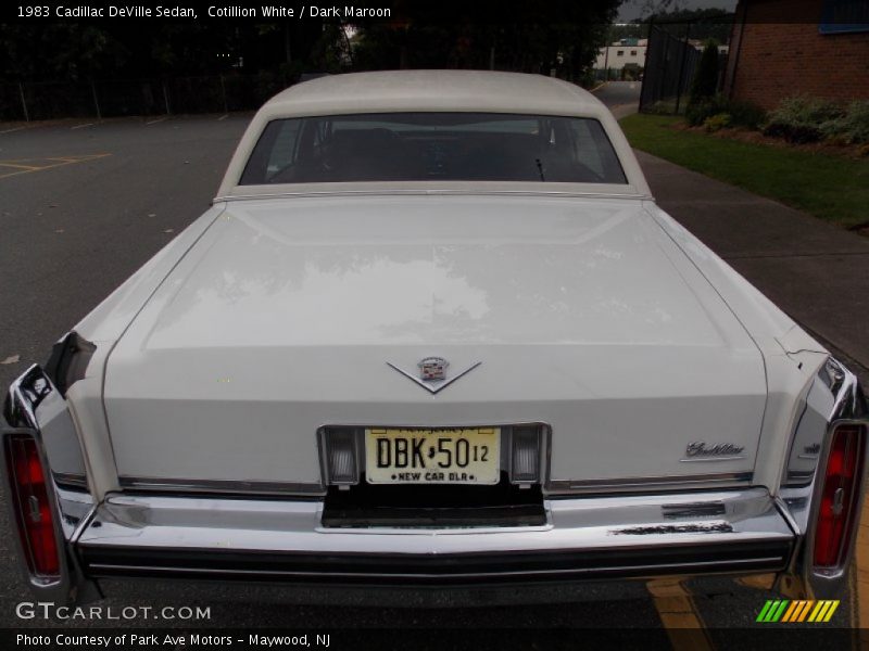 Cotillion White / Dark Maroon 1983 Cadillac DeVille Sedan