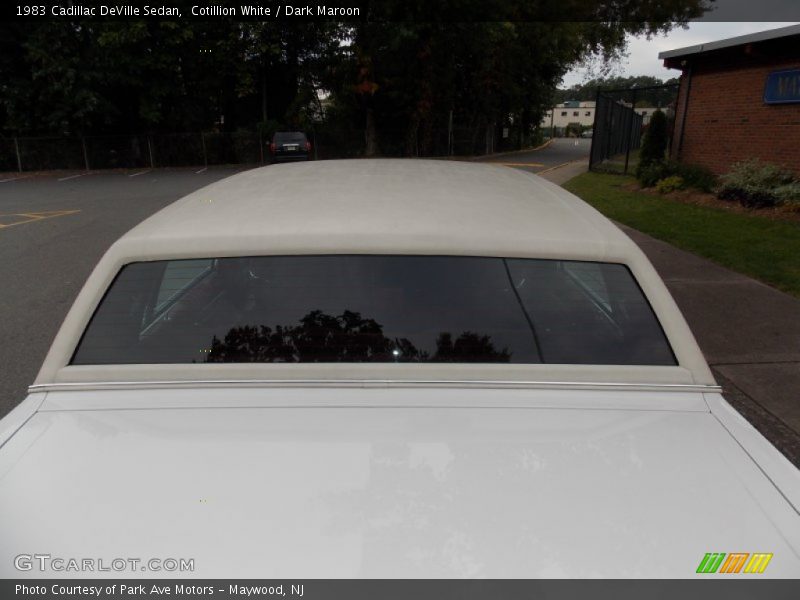 Cotillion White / Dark Maroon 1983 Cadillac DeVille Sedan