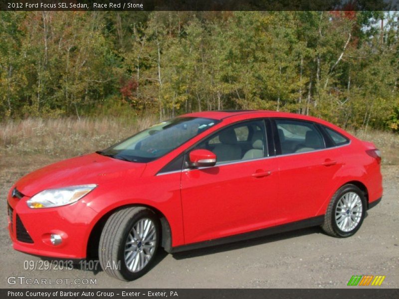 Race Red / Stone 2012 Ford Focus SEL Sedan