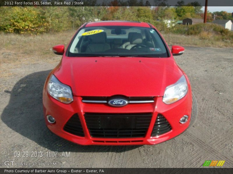 Race Red / Stone 2012 Ford Focus SEL Sedan