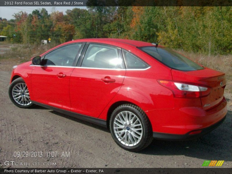Race Red / Stone 2012 Ford Focus SEL Sedan