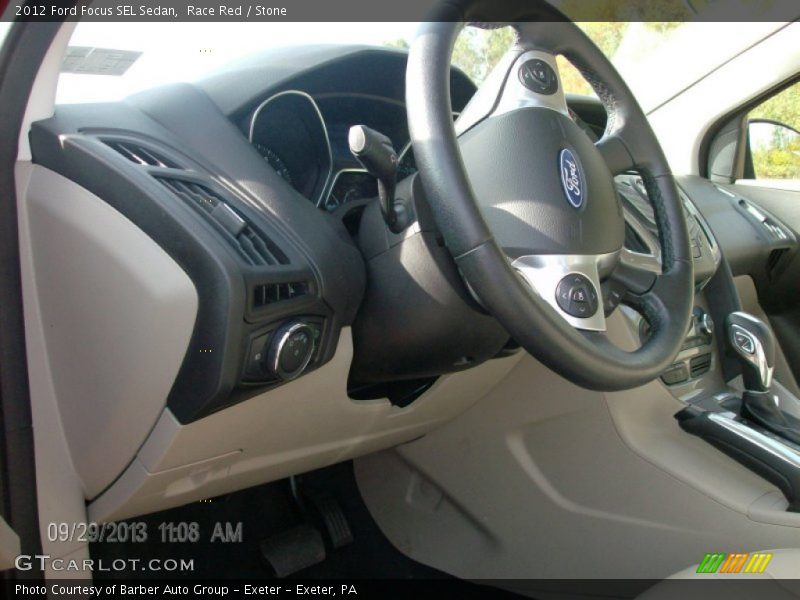 Race Red / Stone 2012 Ford Focus SEL Sedan