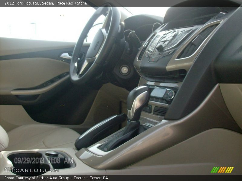 Race Red / Stone 2012 Ford Focus SEL Sedan