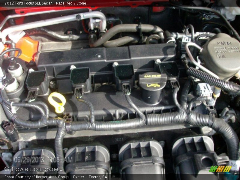 Race Red / Stone 2012 Ford Focus SEL Sedan