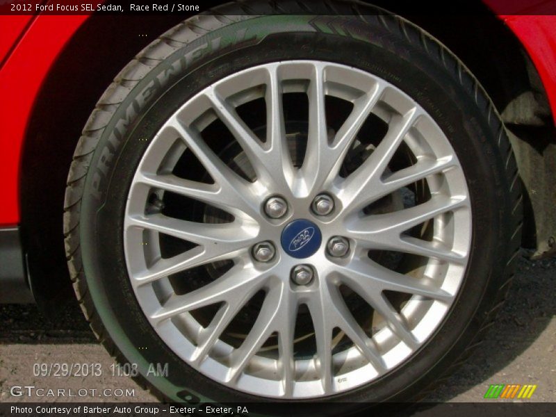 Race Red / Stone 2012 Ford Focus SEL Sedan