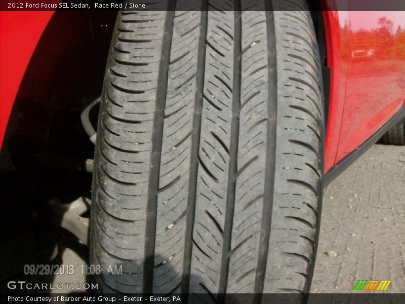 Race Red / Stone 2012 Ford Focus SEL Sedan