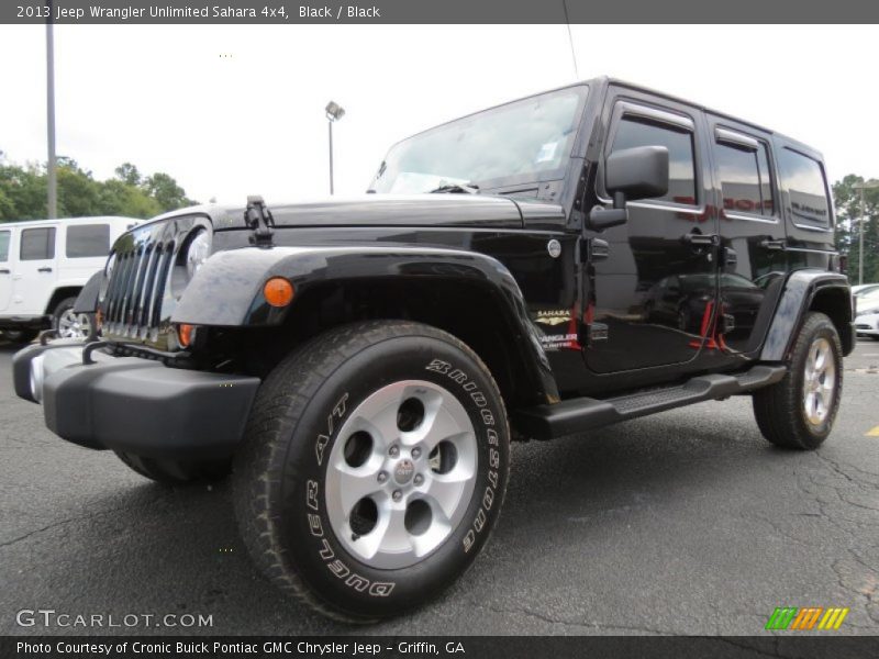 Black / Black 2013 Jeep Wrangler Unlimited Sahara 4x4