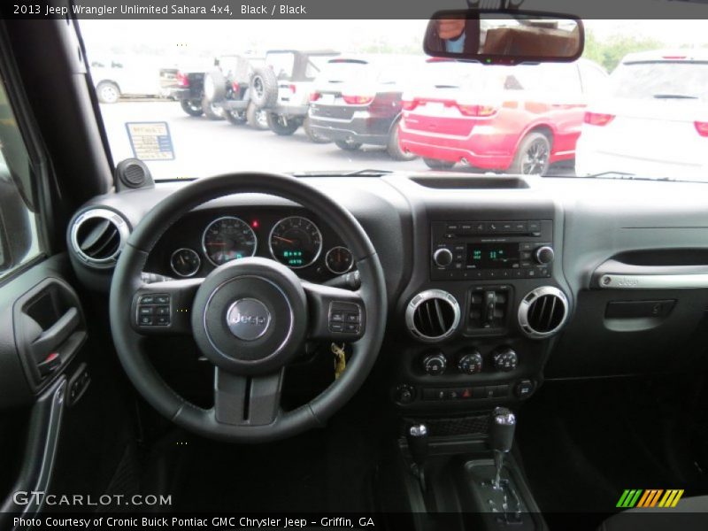 Black / Black 2013 Jeep Wrangler Unlimited Sahara 4x4