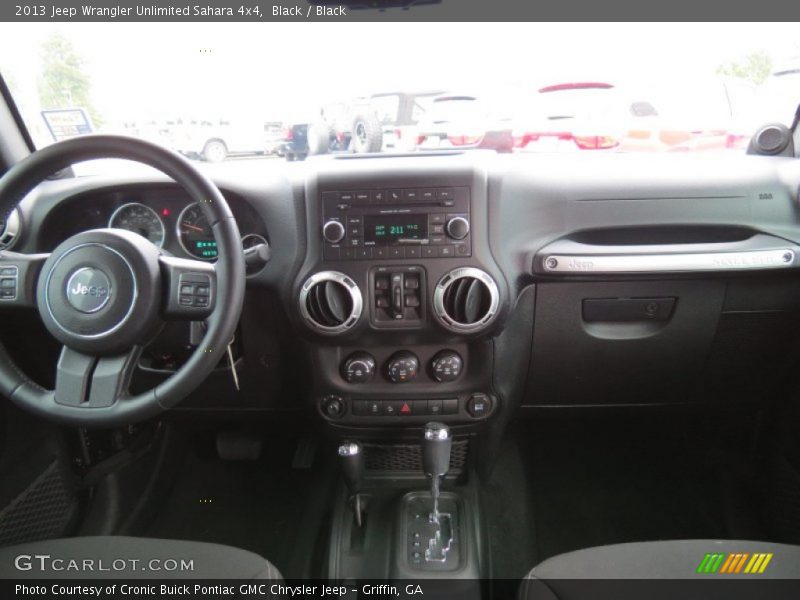 Black / Black 2013 Jeep Wrangler Unlimited Sahara 4x4