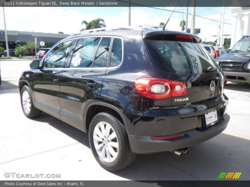 Deep Black Metallic / Sandstone 2011 Volkswagen Tiguan SE
