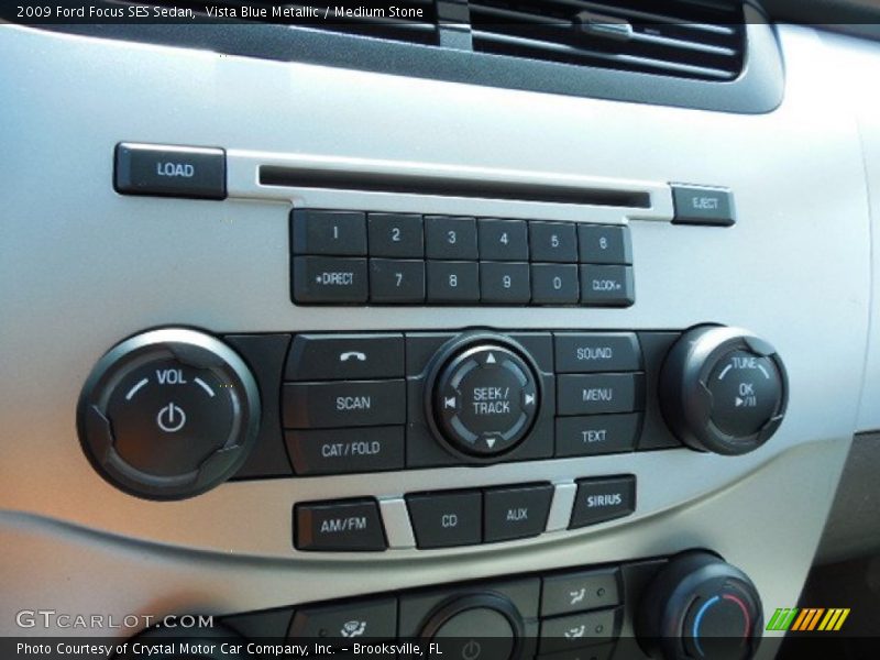 Vista Blue Metallic / Medium Stone 2009 Ford Focus SES Sedan