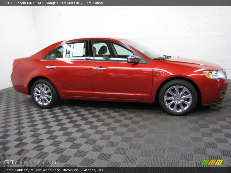 Sangria Red Metallic / Light Camel 2010 Lincoln MKZ FWD