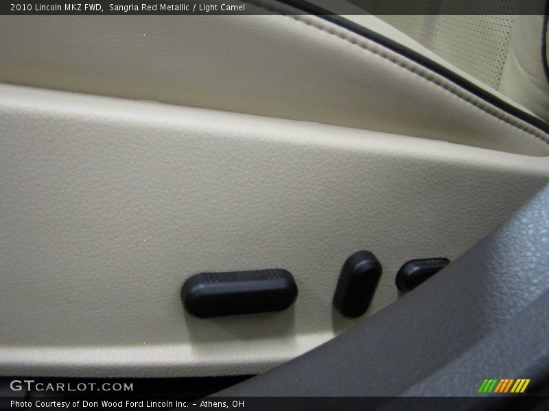 Sangria Red Metallic / Light Camel 2010 Lincoln MKZ FWD