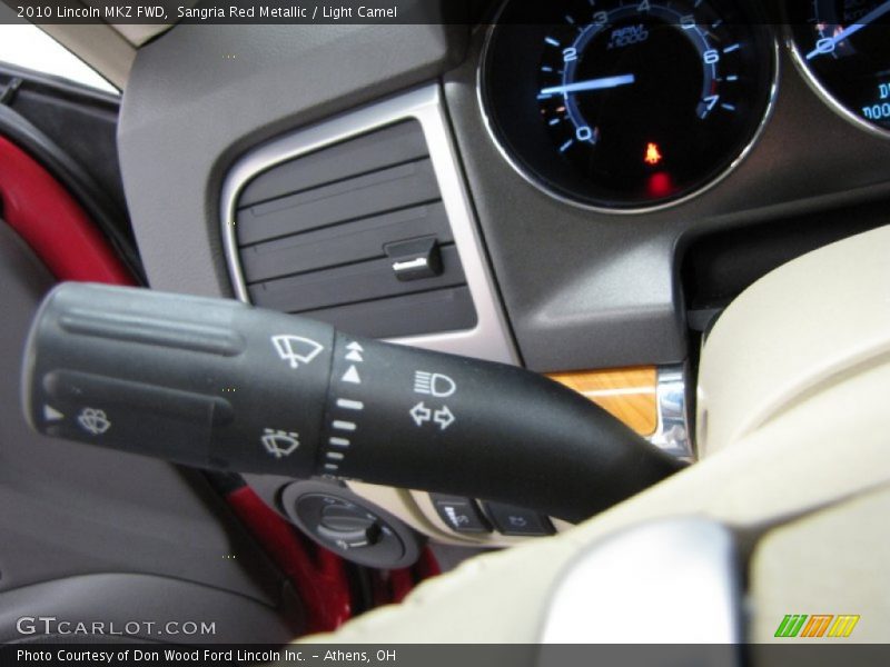 Sangria Red Metallic / Light Camel 2010 Lincoln MKZ FWD
