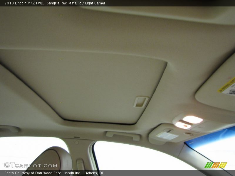 Sangria Red Metallic / Light Camel 2010 Lincoln MKZ FWD