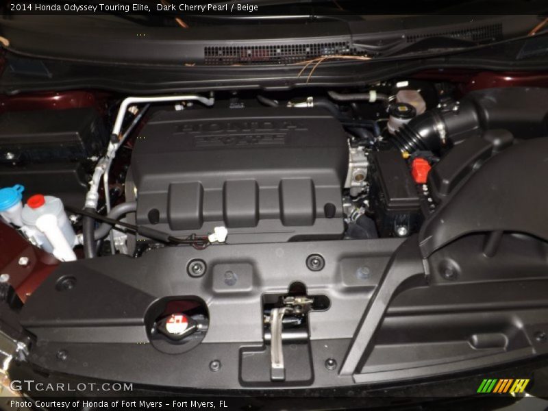 Dark Cherry Pearl / Beige 2014 Honda Odyssey Touring Elite
