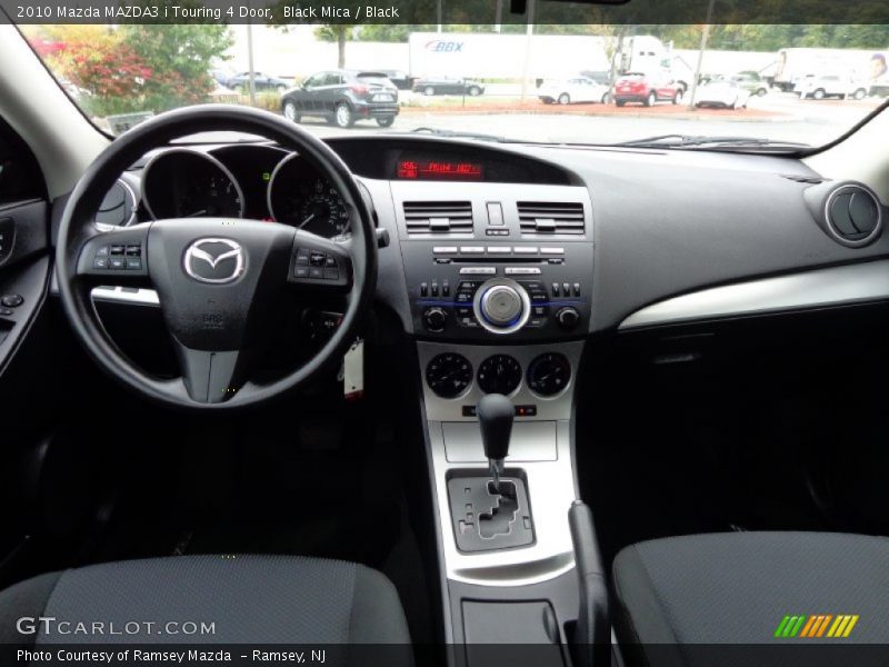 Black Mica / Black 2010 Mazda MAZDA3 i Touring 4 Door
