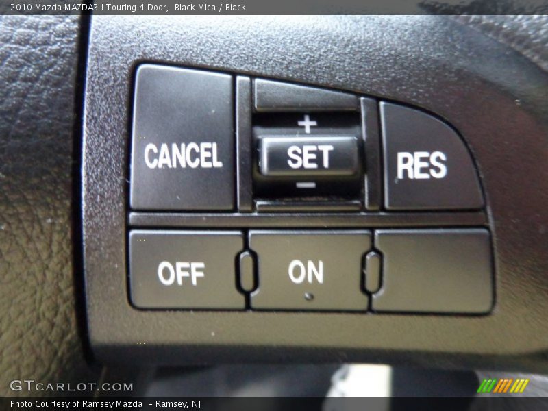 Black Mica / Black 2010 Mazda MAZDA3 i Touring 4 Door