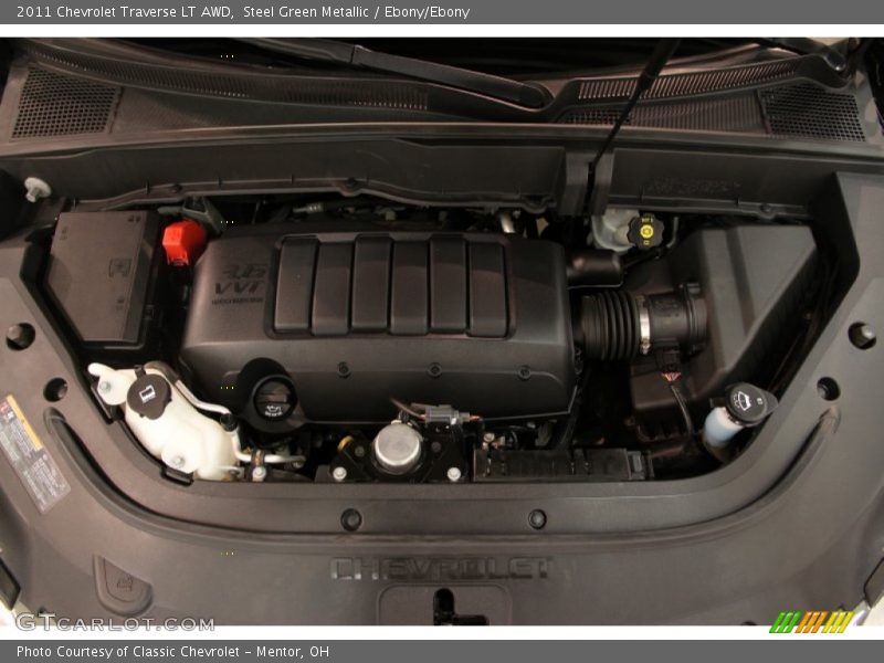 Steel Green Metallic / Ebony/Ebony 2011 Chevrolet Traverse LT AWD
